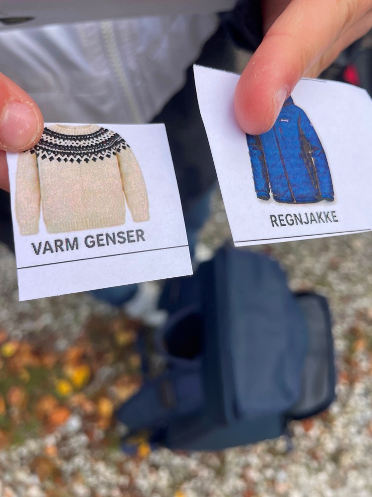 Bilder av varm genser og regnjakke